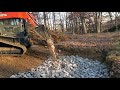 Thumbnail for Part 1 installing livestock drinking rock pad skirt in pond.